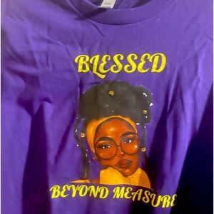 A XL, “Blessed beyond measure” purple t shirt.